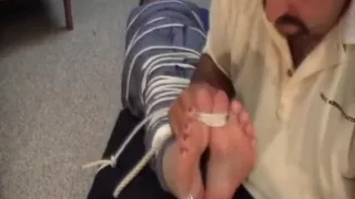 Toetied tickle torture