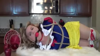 Blonde Woman tied on the kitchen table