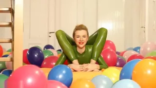 Flexy Sexy Green Rubber Catsuit Blonde Bare Feet & Bendy Positions