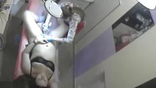 Plucking her pussy hair