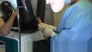 Doctor Fists and Sounds Latex Slave with Gloves in Gyno Chair