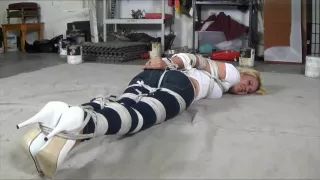 Taped bondage girl