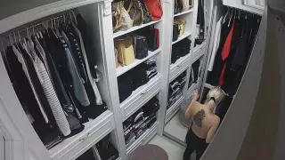 Wife in wardrobe