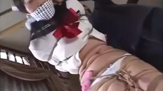 Japanese schoolgirl crying in tight bondage and gagged