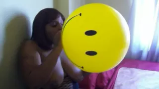 Ebony Smiley Face Balloon Blow