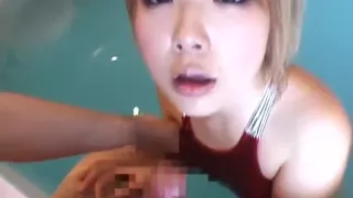 Shiny red metalic swimsuit in the pool