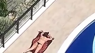 Voyeurism V: woman in bikini (non-nude)