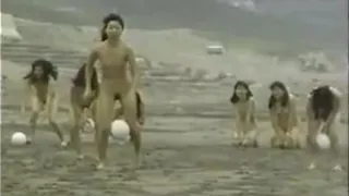 Naked Women Race Across The Beach With A Ball Between Their