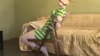 blond girl tied on chair