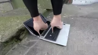 Laptop crushed stamped on and destroyed in High heels