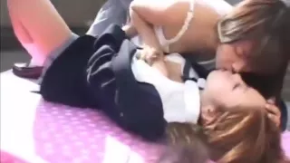 2 Lesbian Japanese student are kissing outside school