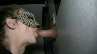 my girlfriend  sucks off old geezer at the gloryhole in mask