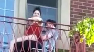 Shameless couple on balcony