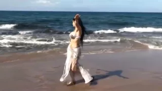 Sexy bellydancer rolls her belly