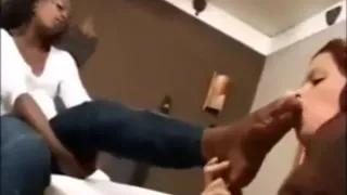 Black mistress forces her lez slave to worship her stinky feet out of boots