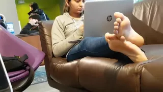 Candid teen schoolgirl in the library