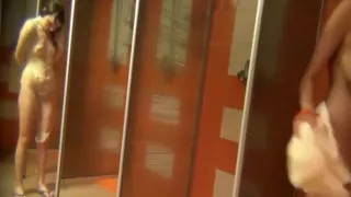 Beautiful soaping milfs in public shower room