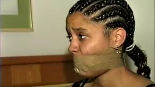 Ebony Girl Gagged With Stuffing And Tape