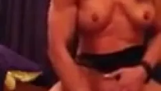 Fit and muscular hoe plays with her cunt