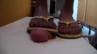 Cock smashed flat under Heather's sandals