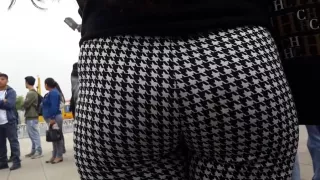 Rich babe in leggings in a row