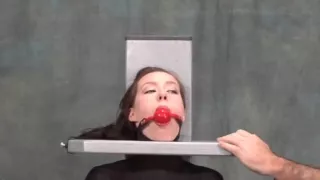 Attractive lady performing in BDSM action