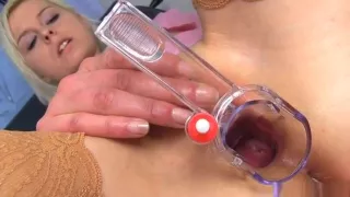 Pretty female is playing with her pussy