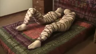 Two girls in mummy bondage