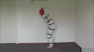 Mummified girl struggles and hops