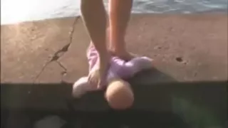 crush a doll outside