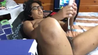 Indian Nerdy girl masturbating with vibrator and hanger