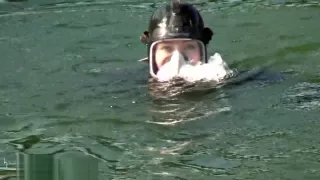 Rubber girl dive with black FFM