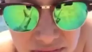 Two Spanish girls teasing topless on the beach