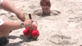 beach burial tickle torture
