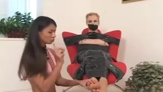 Tape bondage girl
