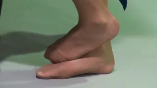 Hostess with Distressed Nylons Completely Shoeless