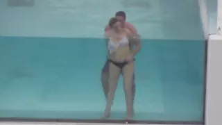 Another couple fucking in the pool