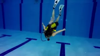 scuba girl in pool