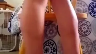 Short dress and high heels legs crossed voyeur