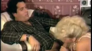 Porn Star Amber Lynn gives a guy a blowjob