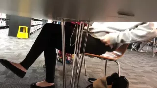 Black flats dangling