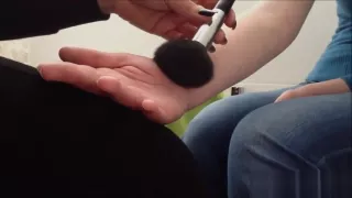 Scratching arm and tickle