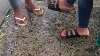 Orange toes at the bus stop