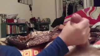 Wife giving hand job while reading.