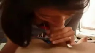 Asian Girl Sucks in a Tent