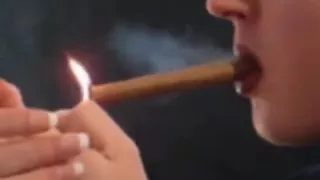 Nicole smoking cigar