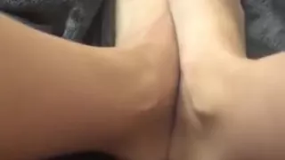 size 6.5 feet being rubbed with lotion