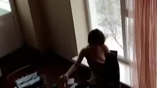 amateur girlfriend  almost caught masturbating naked in the window of the office