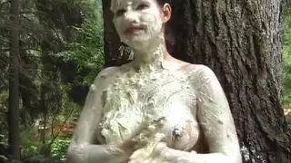 Topless girl pied outside