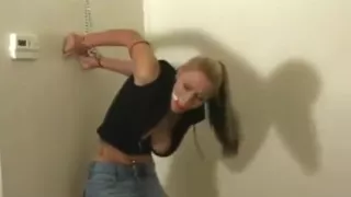 Girl stand cuffed
